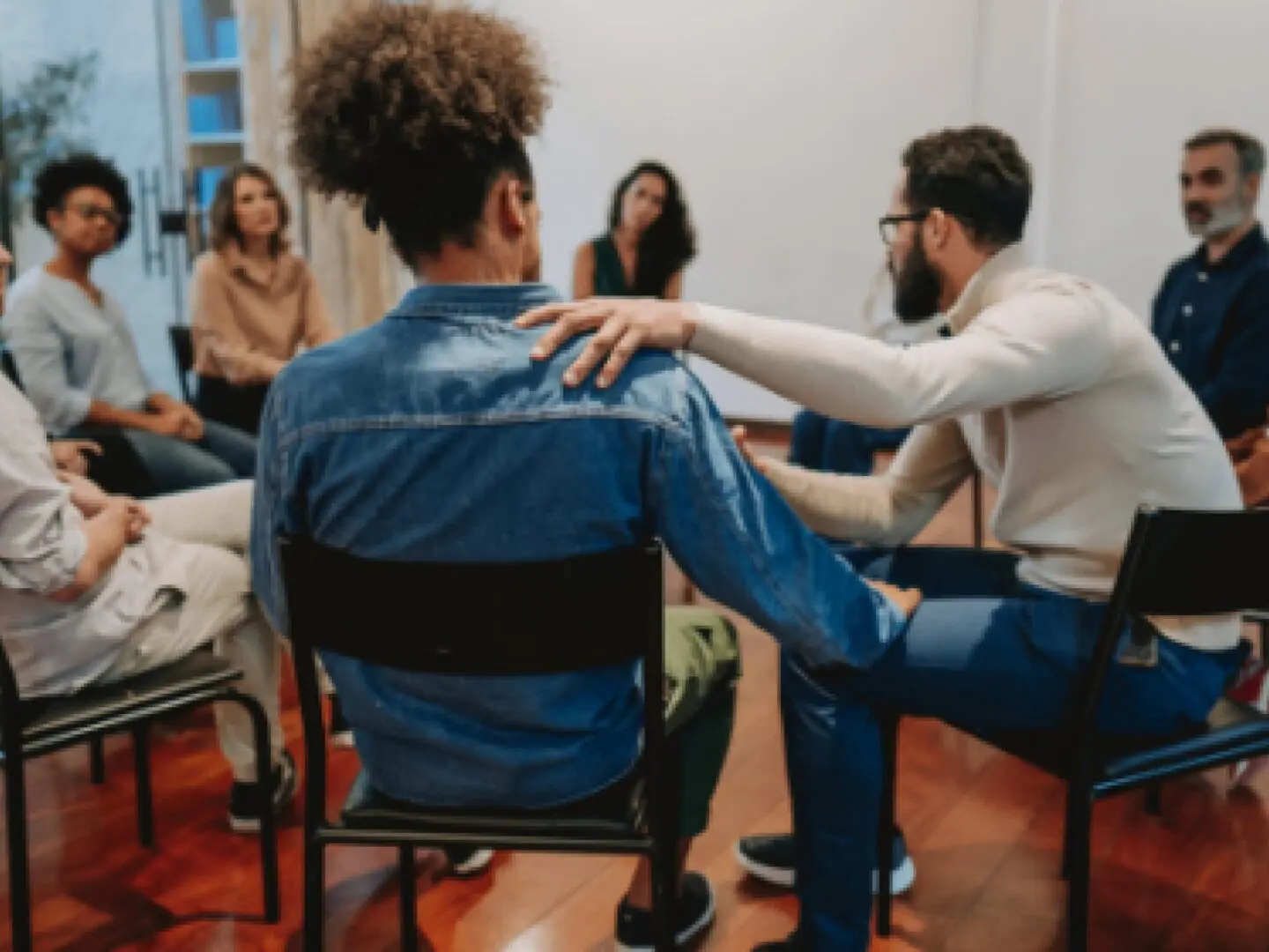 Support-after-a-suicide-480x280 A group of people sitting in chairs and talking.